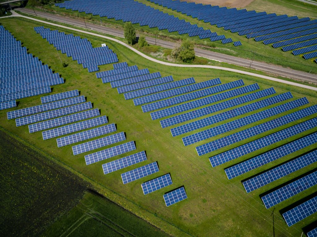 A field of solar panels in the sun.